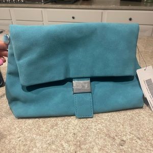 New! Versatile clutch/crossbody
